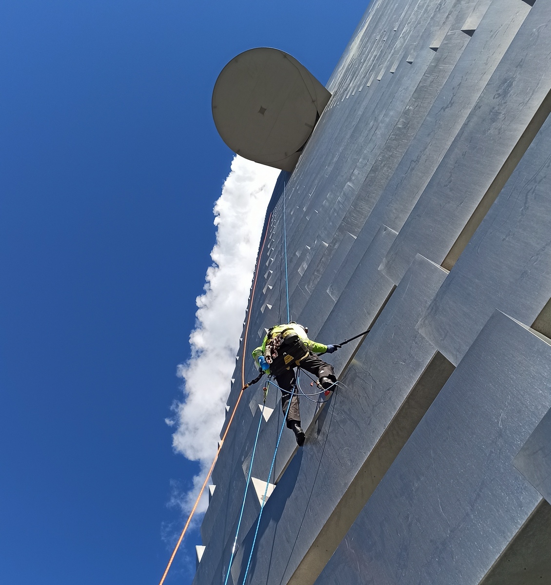 Rope access team working offshore